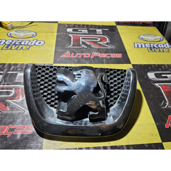 Emblema Parachoque Dianteiro Peugeot 207 Original 303002001